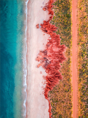 an aerial drone photo of James Price Point on the dampier peninsula at sunrise available buy as a fine art photo print framed or canvas.