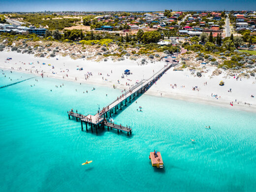 An aerial drone photo of Coogee Beach Jetty in South Fremantle, Perth, Western Australia. Buy now as a fine art framed or canvas print with shipping worldwide.