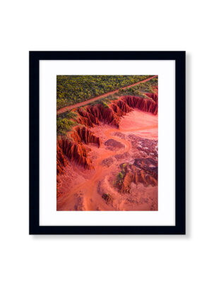 An Aerial Drone Photo of the red cliffs at James Price Point during Sunset. Available as a fine art framed photo print.